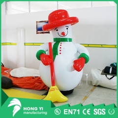 Large inflatable sweeping snowman cartoon wearing red cap of snowman decoration